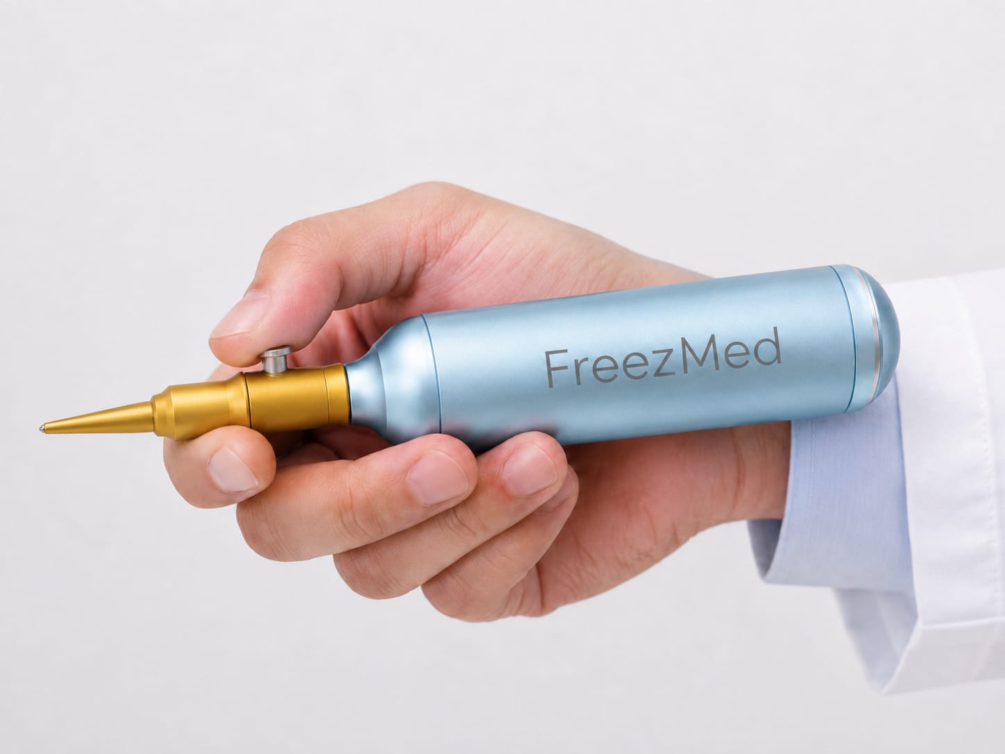 FreezMed handpiece held by a clinician